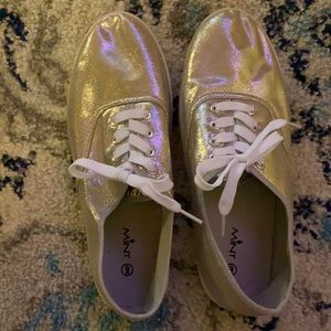 Cute pair of lightweight metallic sneakers worn half an hour with socks. Comfy.